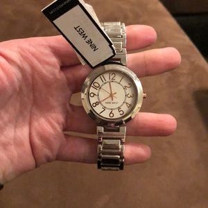 Silver and rose gold watch